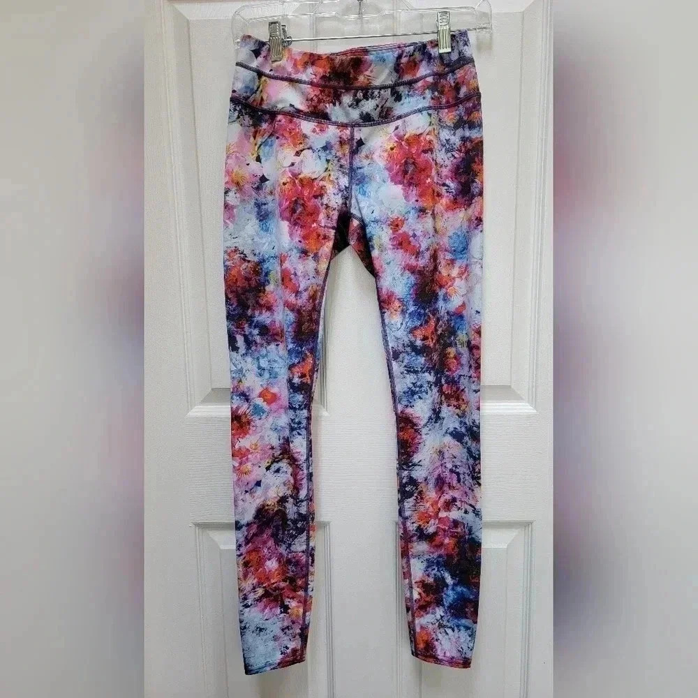 Athleta Hypersonic Sonar Watercolor Leggings with back zipper pouch Size Small